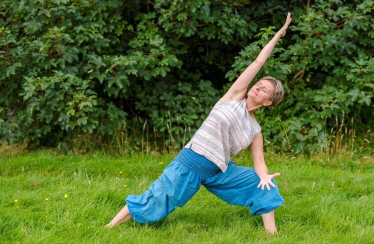 A person doing yoga outside