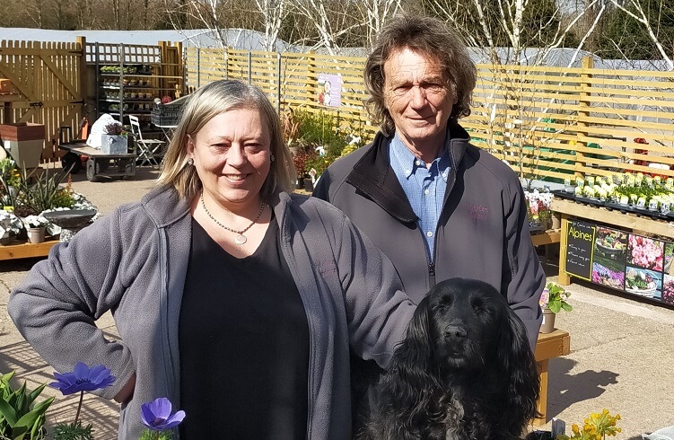 The owners of Wykeham Gardens alongside some of their plants for sale